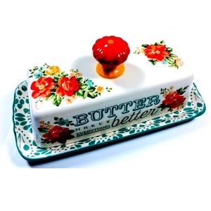 Vintage ceramic floral butter dish. New condition. Floral theme.